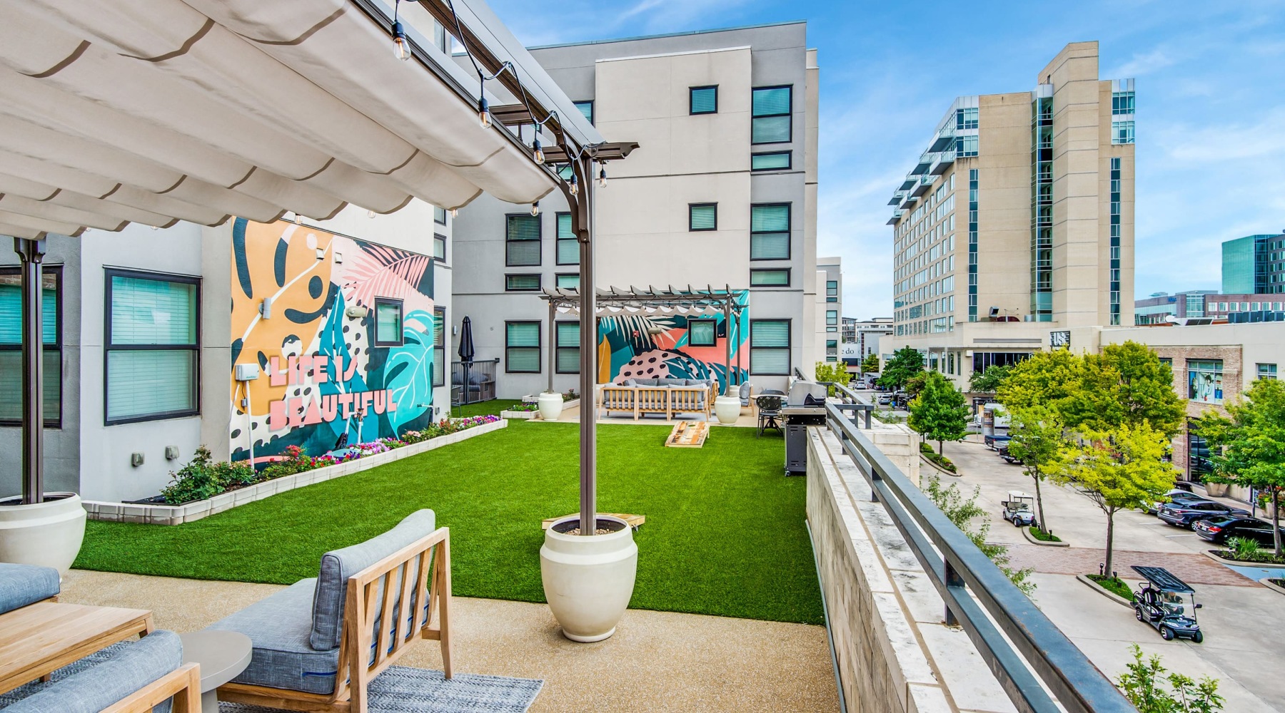Vibrant and Modern outside lounge area with city views