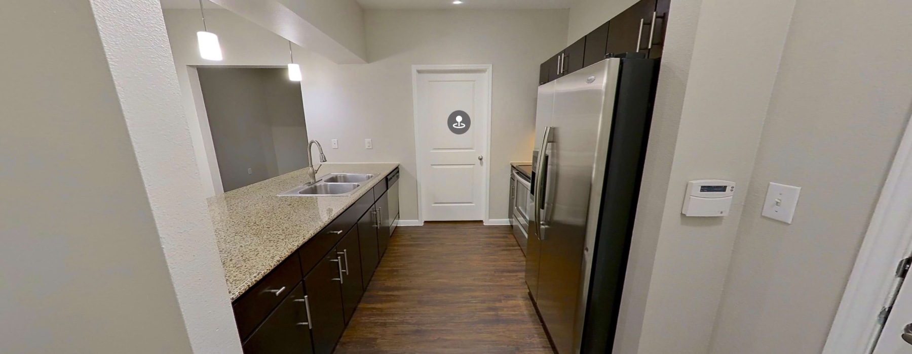 kitchen with granite countertops and brown cabinets